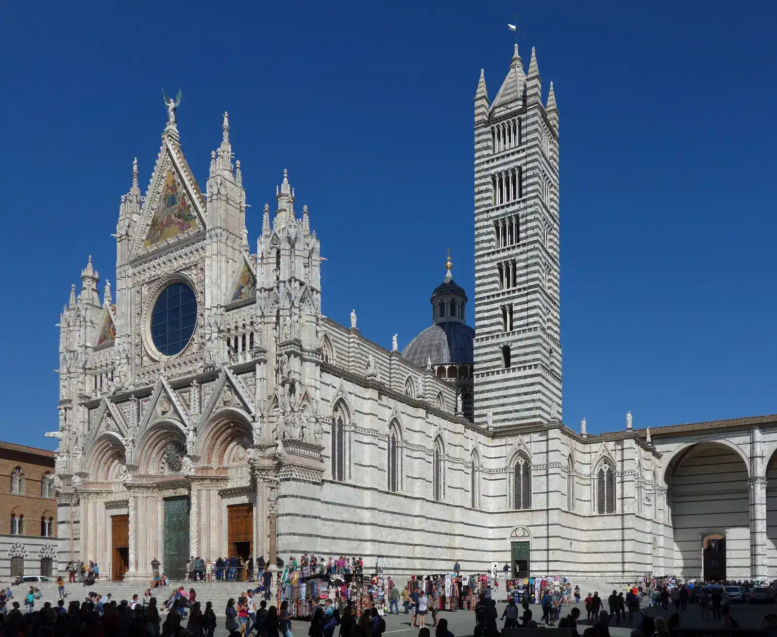 Exterior of Siena Cathedral with its striped marble bell tower