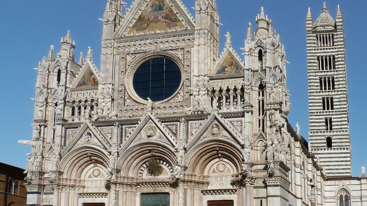 Black and white marble facade of Siena Cathedral